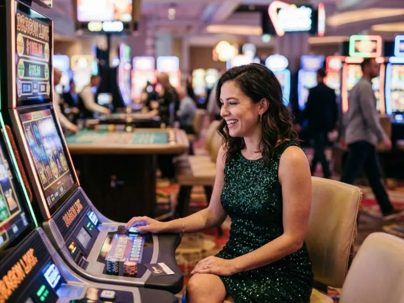 Elegant woman enjoying games with GCash with focus and excitement